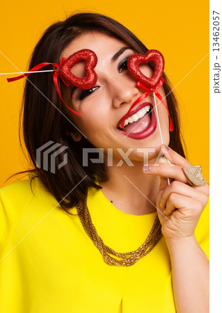 Beautiful girl holding red hearts 13462057