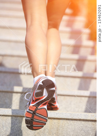 sports legs running/climbing on mountain stairs  13462091