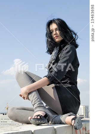 Young woman on roof 13463698