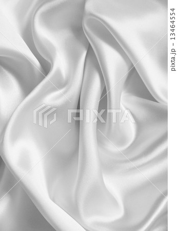 Smooth elegant white silk as wedding background Smooth elegant white silk as wedding background 13464554