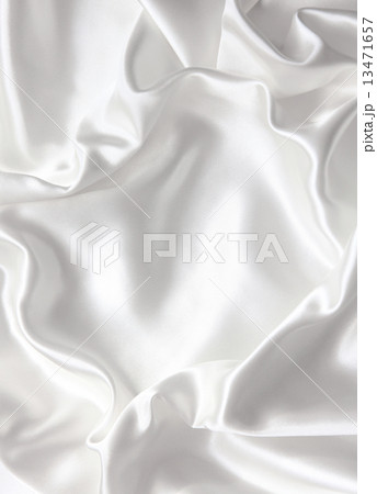 Smooth elegant white silk as wedding background Smooth elegant white silk as wedding background 13471657