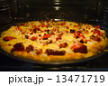 Pizza baking in oven 13471719