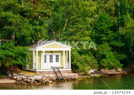 Yellow Finnish Wooden Bath Sauna Log Cabin On Island In Summer Yellow Finnish Wooden Bath Sauna Log Cabin On Island In Summer 13474234