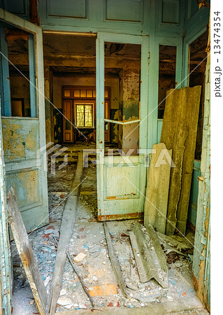Dilapidated passage in school of Pripyat. Chernobyl Disaster 13474354