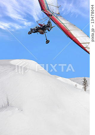 Hang glider above mountain 13478044