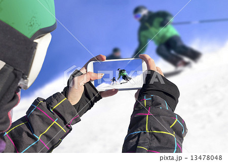 Photographed two skiers with cell phone Photographed two skiers with cell phone 13478048