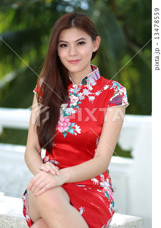 Beautiful girl in attractive Cheongsam 13478559