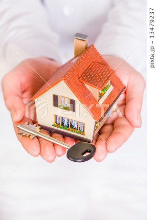 House in human hands House in human hands 13479237