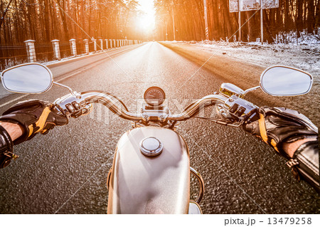 Biker First-person view. Winter slippery road 13479258
