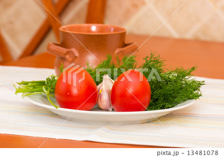 Fresh vegetables and soup in the pot 13481078