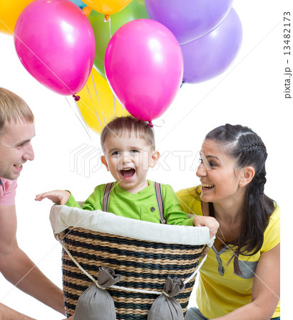 family playing with son in flight on a makeshift balloon family playing with son in flight on a makeshift balloon 13482173