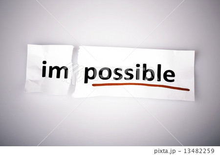 The word impossible changed to possible on torn paper The word impossible changed to possible on torn paper 13482259