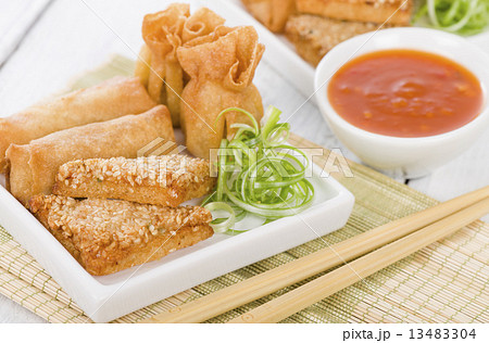 Asian Starters - Fried wontons, prawn toast and spring rolls  13483304