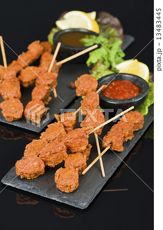 Spicy Chicken Satay - Marinated chicken meatball skewers  13483445