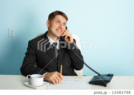 Business man talking on phone 13483798