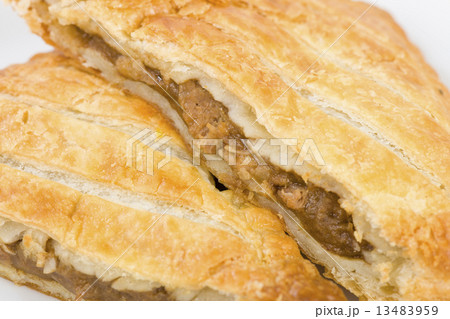 Steak Pasty - Puff pastry parcel filled with beef and gravy Steak Pasty - Puff pastry parcel filled with beef and gravy 13483959