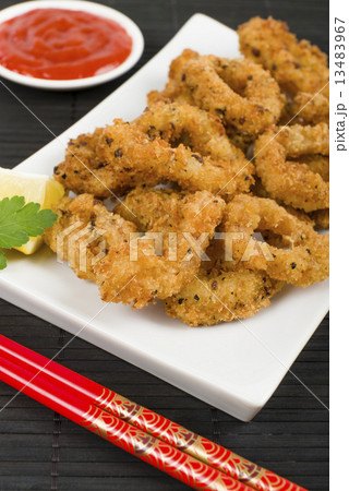 Ika Furai - Deep fried breaded squid rings with chili sauce. Ika Furai - Deep fried breaded squid rings with chili sauce. 13483967