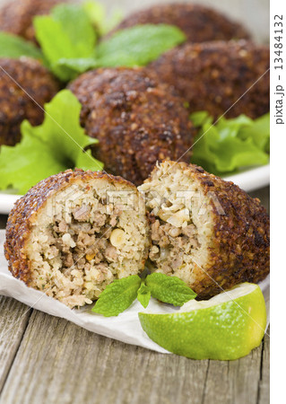 Kibbeh - Middle Eastern minced meat and bulghur fried snack  13484132