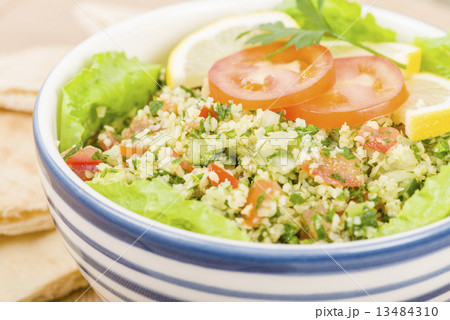 Tabbouleh - Arabic salad made with bulghur wheat  13484310