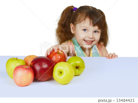 Little cheerful girl with apples Little cheerful girl with apples 13484421