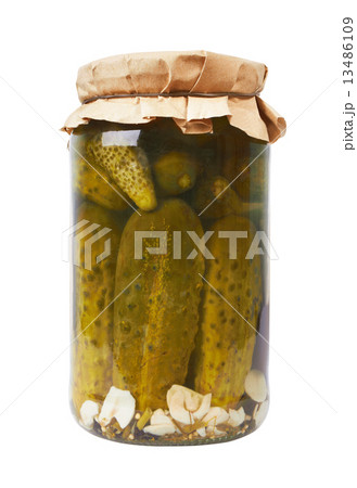 Glass jar with pickled cucumbers 13486109