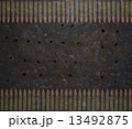 Metal plate with holes from bullets 13492875