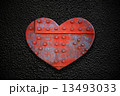 Metal heart on a dark texture 13493033