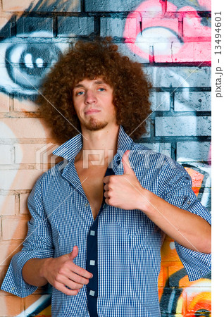The young man with curly hair The young man with curly hair 13494601