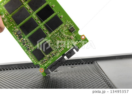 Opened solid state drive closeup Opened solid state drive closeup 13495357