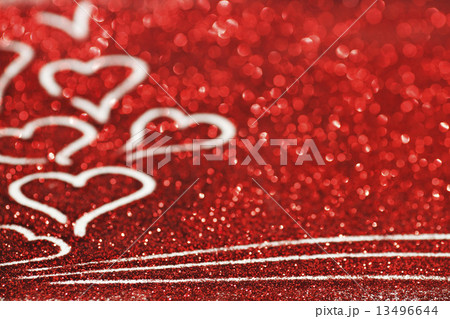 Glitter background with hearts 13496644