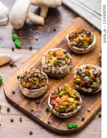 Portobello mushrooms stuffed with vegetables 13498090
