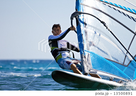 Front view of young windsurfer close-up 13500891