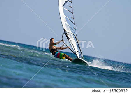 Fast approaching windsurfer 13500935