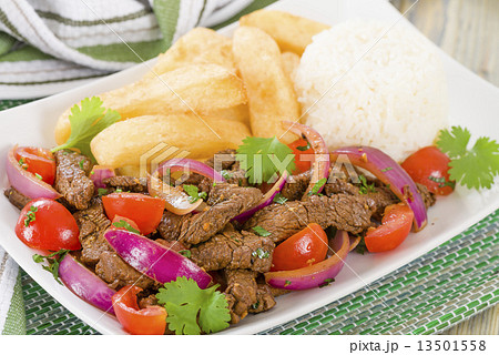 Lomo Saltado - Traditional Peruvian beef stir-fry. 13501558
