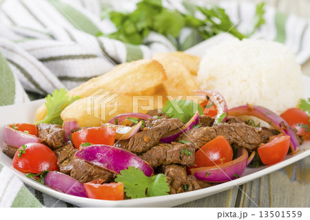 Lomo Saltado - Traditional Peruvian beef stir-fry. 13501559