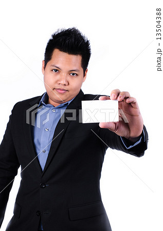 Man's hand showing business card Man's hand showing business card 13504388