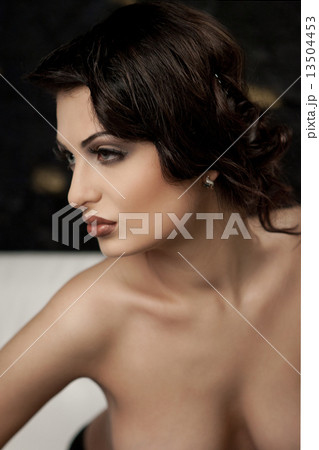 Beautiful woman with bare shoulders 13504453