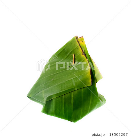 Thailand dessert wrapped in banana leaves isolated on white back Thailand dessert wrapped in banana leaves isolated on white back 13505297