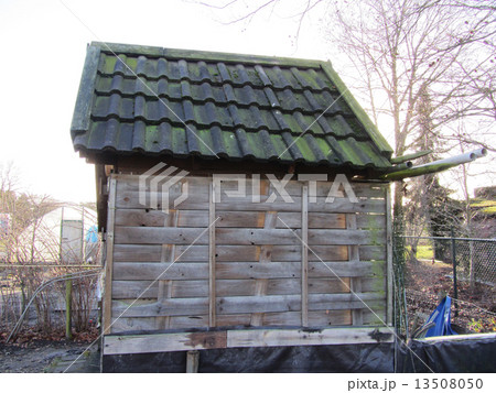 Small wooden house side view Netherlands 13508050