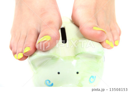 women feet (pedicure)  with coin bank 13508153