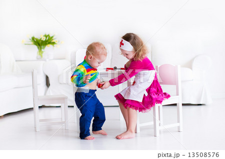 Kids playing doctor Kids playing doctor 13508576