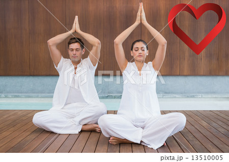 Composite image of attractive couple in white sitting in lotus p 13510005