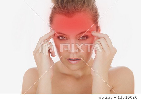 Woman massaging her temples 13510026