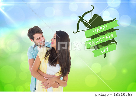 Composite image of happy casual couple smiling at each other 13510568