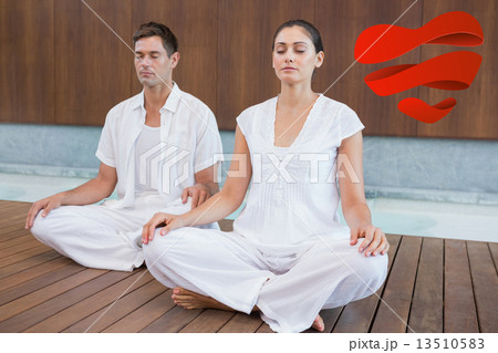 Composite image of attractive couple in white sitting in lotus p Composite image of attractive couple in white sitting in lotus p 13510583