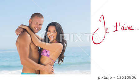Composite image of attractive young couple hugging each other Composite image of attractive young couple hugging each other 13510906