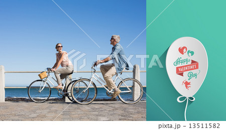 Composite image of happy casual couple going for a bike ride on 13511582