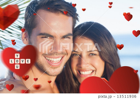 Composite image of cheerful loving couple having holidays Composite image of cheerful loving couple having holidays 13511936