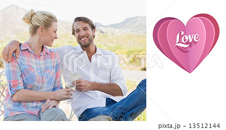 Composite image of cute couple sitting in the garden enjoying wi 13512144