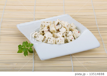 Cheese with spices and oil 13514698